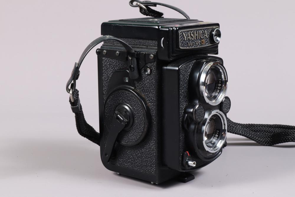 A Yashica Mat-124 G TLR Camera, serial no 124622, body VG, dust to mirror  and screen, Copal-SV shutter working, meter reacts to light, Yashinon 80mm  f/3.5 lens F-G, moderate fungus