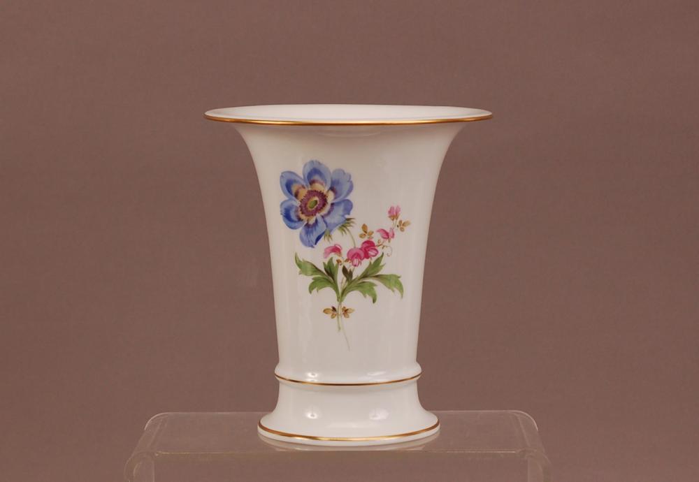 A late 19th century porcelain Meissen trumpet vase, floral design with ...