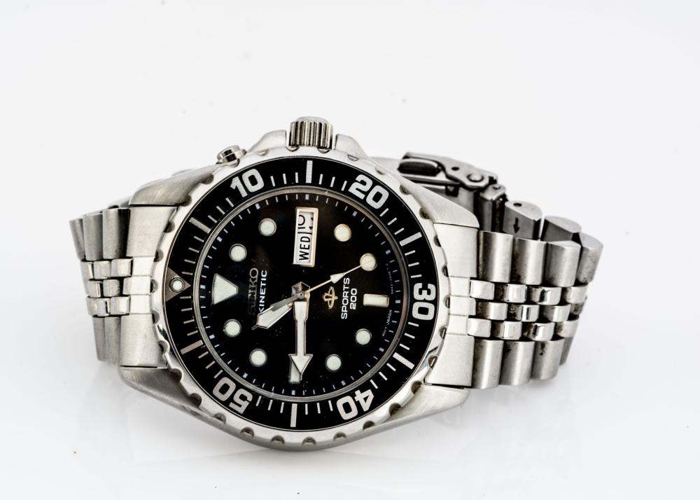 SEIKO, A modern Seiko Kinetic Sports 200 diver's stainless steel  wristwatch, 41mm, black dial with luminous dots and having day and date  aperture, appears to run well, on Seiko stainless steel 