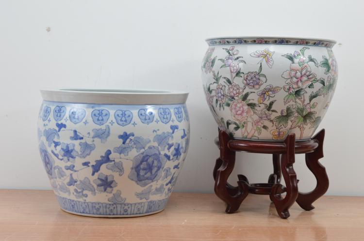 Two 20th century Chinese ceramic fish bowls, one with a blue and white