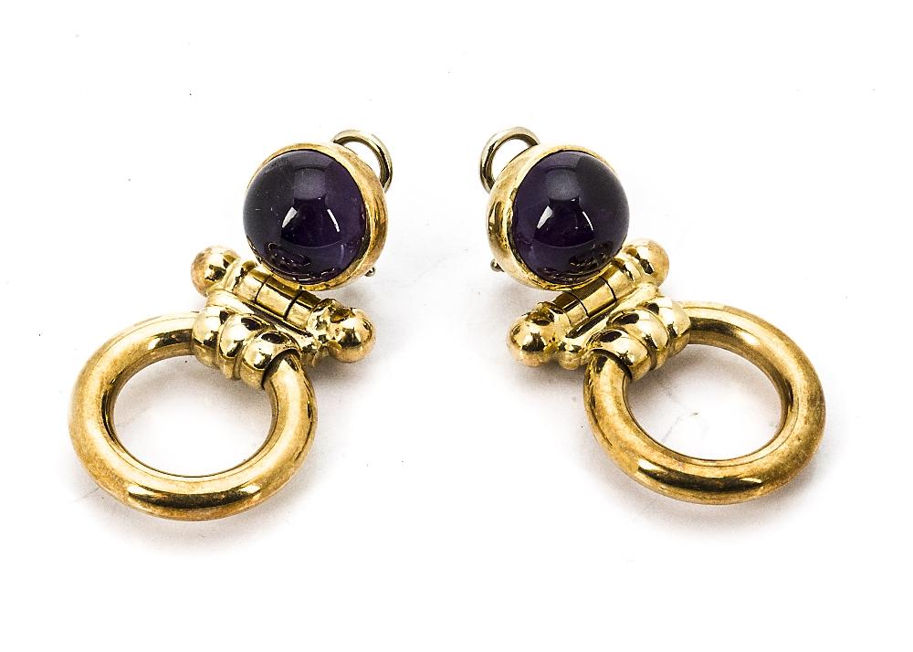 A pair of continental 14K marked amethyst drop earrings, with clip ...