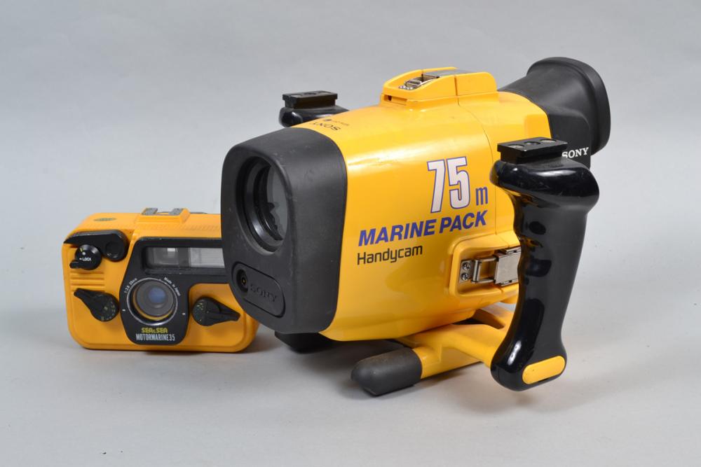 A Sea & Sea Camera and a Sony Handycam Marine Pack, a Sea